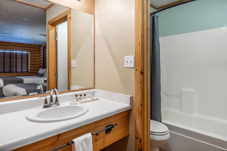 Designer toiletries, hair dryer, bathrobes, towels