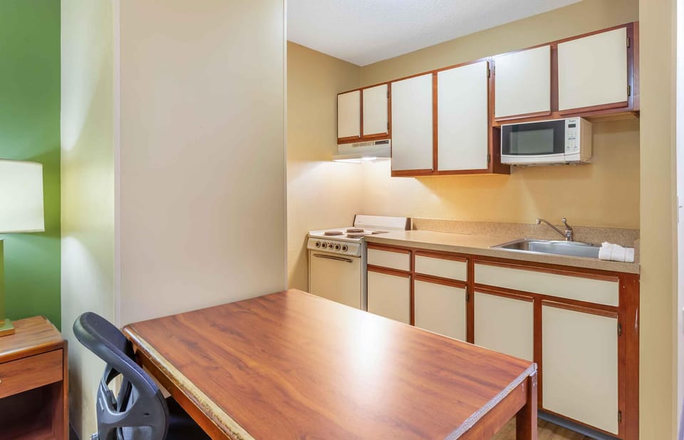 Studio, 1 Queen Bed, Non Smoking | Private kitchen | Fridge, microwave, stovetop
