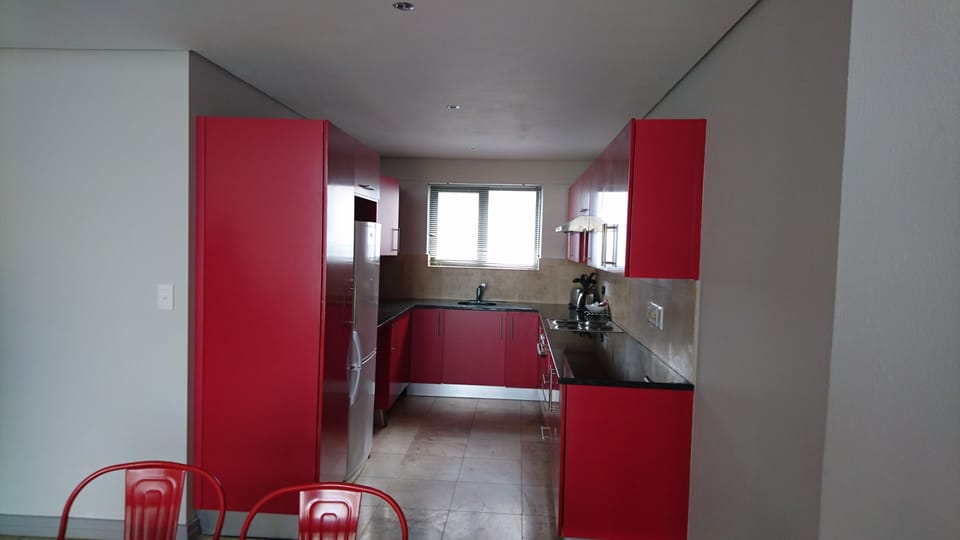 Three Bedroom Apartment | Private kitchen | Coffee/tea maker, highchair, cleaning supplies
