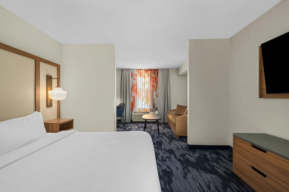 Premium bedding, desk, blackout drapes, iron/ironing board