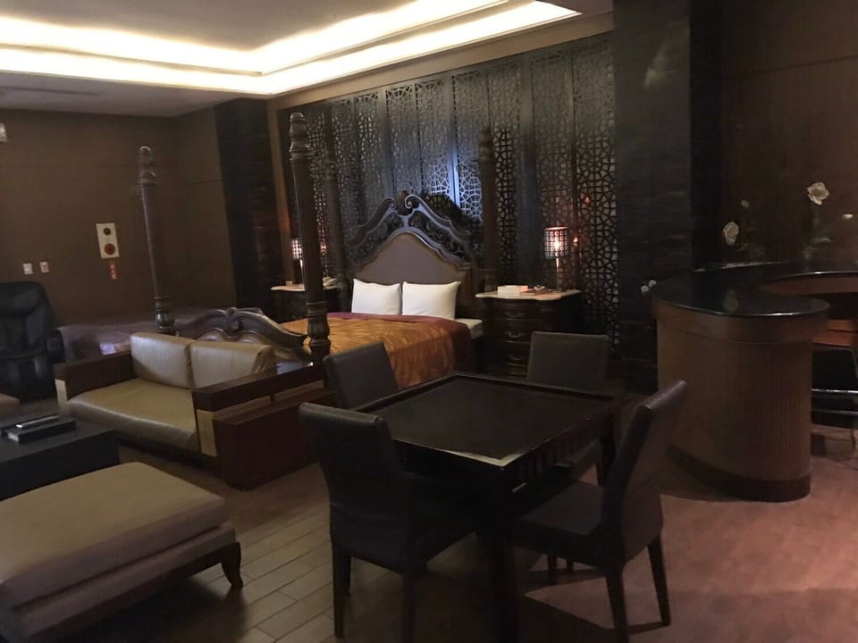 Premium Quadruple Room (KTV) | Free minibar, individually decorated, individually furnished