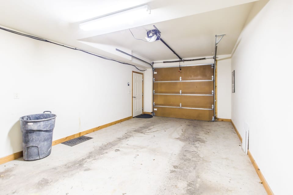 One car attached garage.