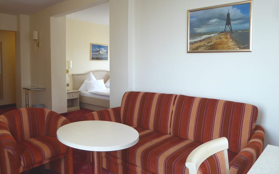 Junior Double Room | Living area | LED TV