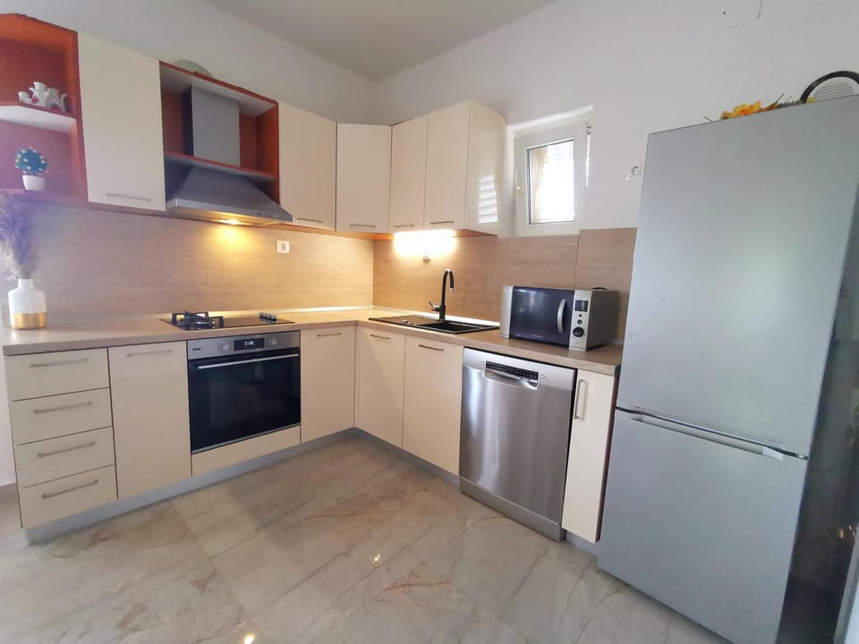 Apartment (Two Bedroom Apartment) | Private kitchen | Fridge