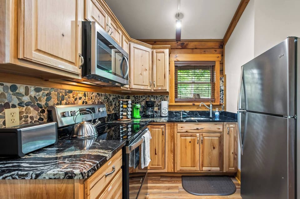 All new kitchen. Hickory cabinets, beautiful granite counters and Stainless steel appliances.