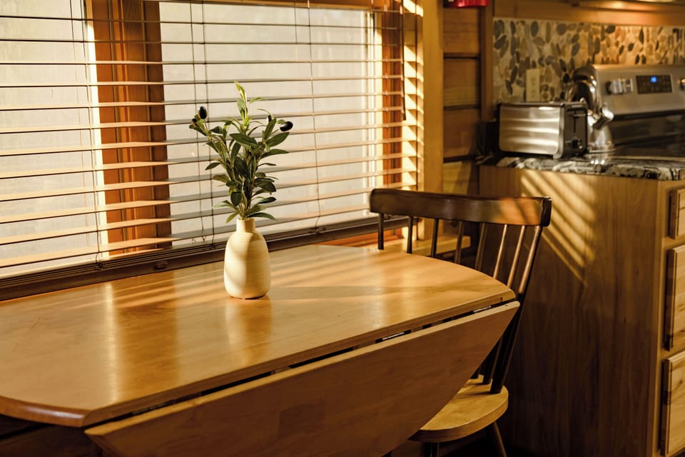 Indoor dining at a beautiful maple drop leaf table. 