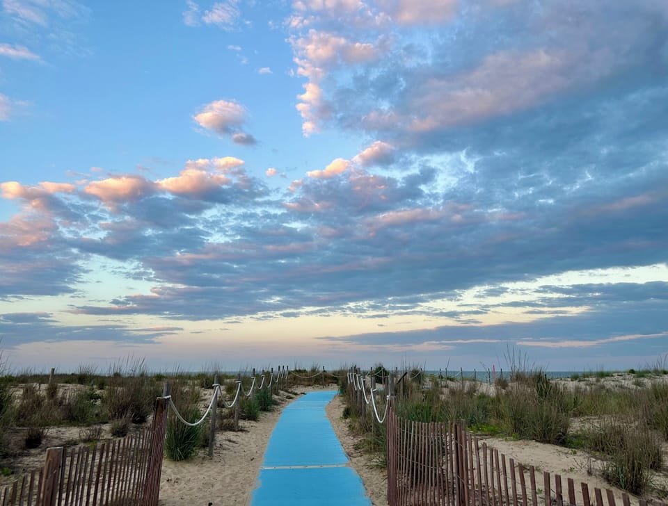 Scenic Pathway Through Sand Dunes to the Beach