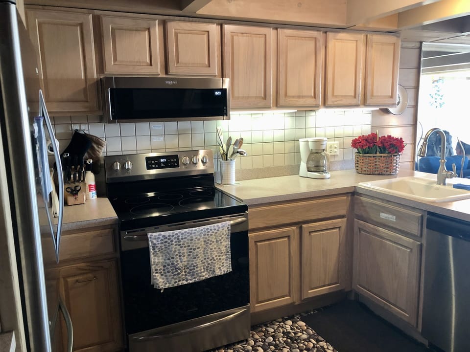 Complete Kitchen with Stove, Microwave, Oven, and Dishwasher 