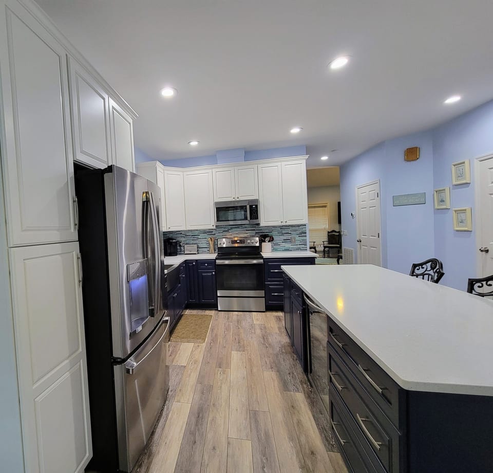New full-size refrigerator, drinks fridge, and convection oven with air fryer!