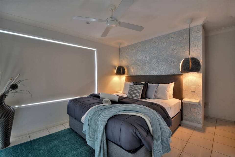 Beautiful master bedroom with brand new king sized bed and dressing room plus ensuite...overlooks the pool and water.