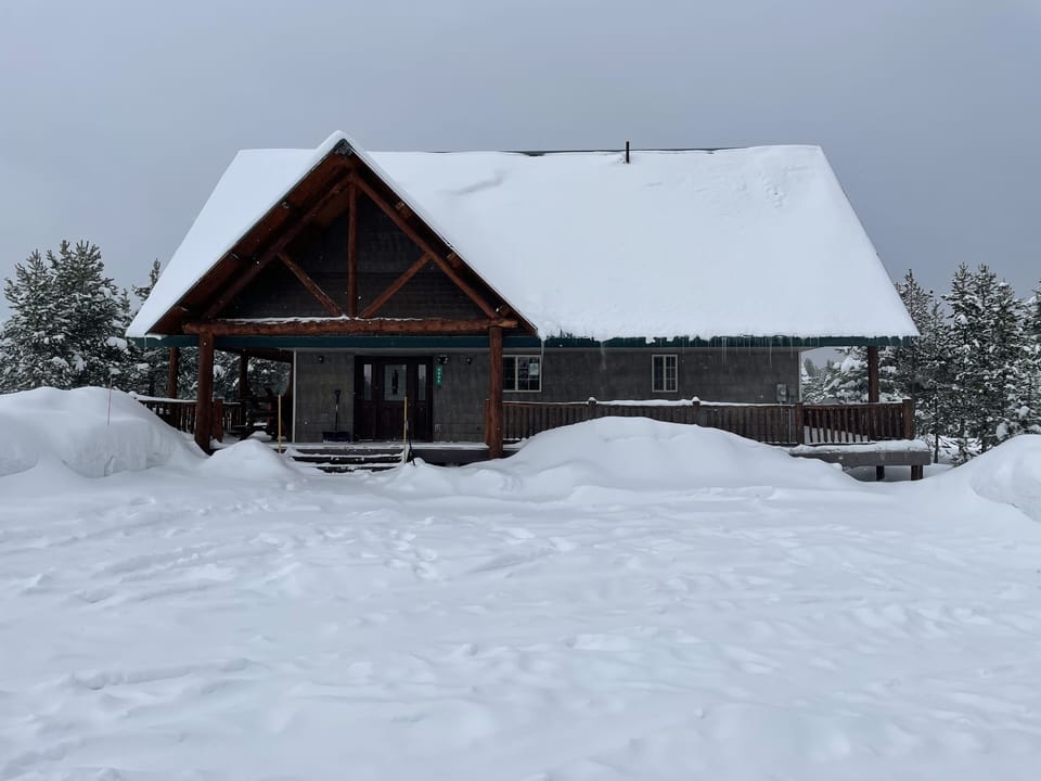 Front of cabin with parking