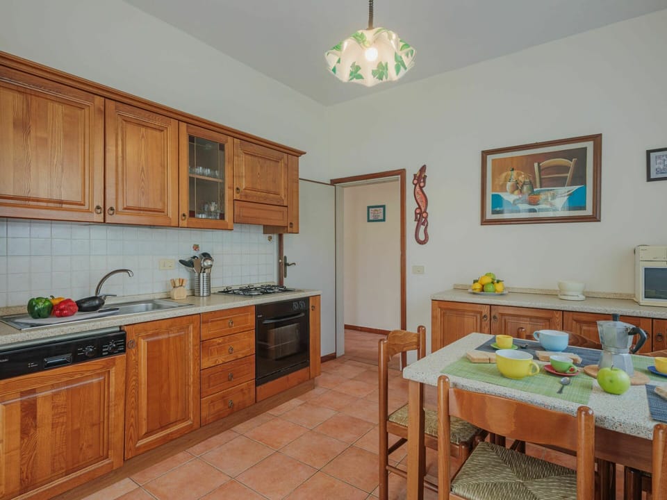 Cabinetry, Kitchen Sink, Sink, Tap, Furniture, Property, Picture Frame, Countertop, Table, Plumbing Fixture
