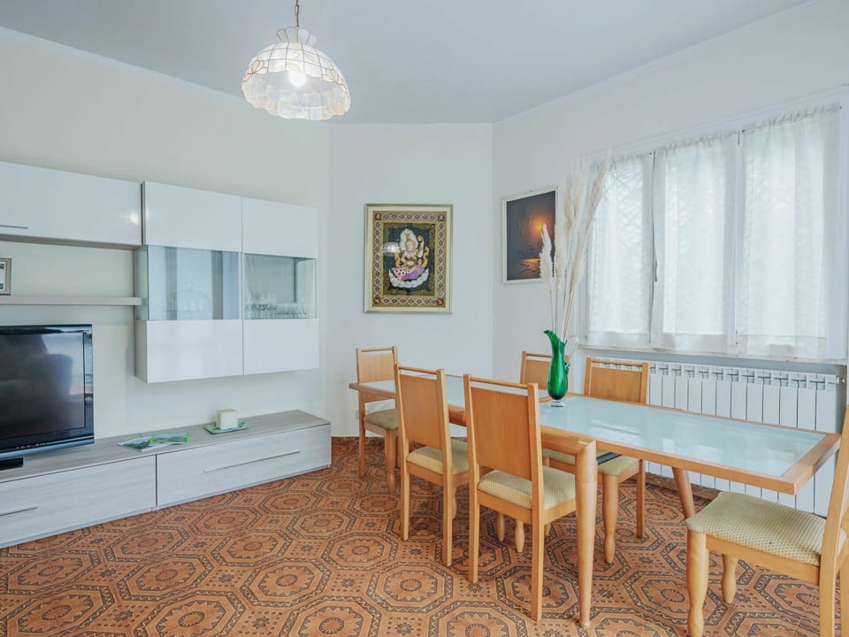 Table, Furniture, Property, Chair, Couch, Cabinetry, Picture Frame, Building, Azure, Wood