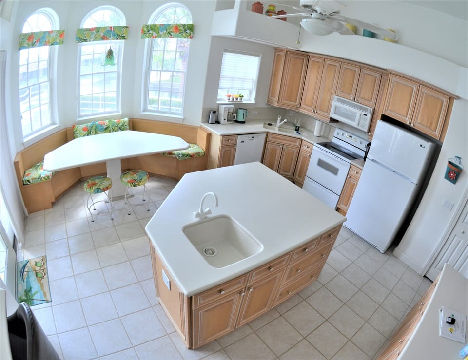 Newer appliances, glass top stove, oven, micro-refrigerator, with freezer.  