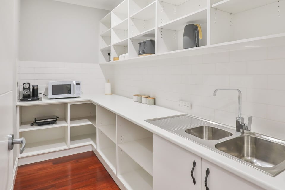 Luxury House | Private kitchen | Full-size fridge, microwave, oven, stovetop