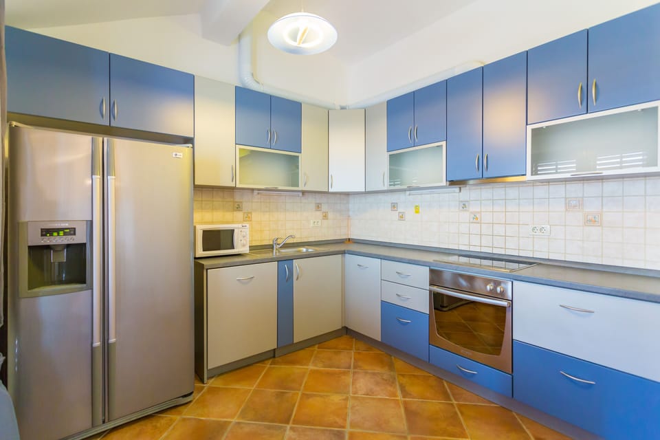 Apartment (Two Bedroom Apartment) | Private kitchen | Fridge, microwave, electric kettle