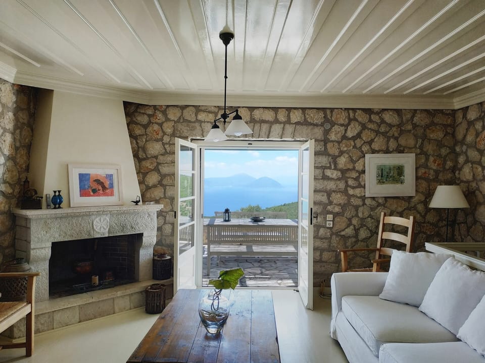 Villa | Living room | Fireplace