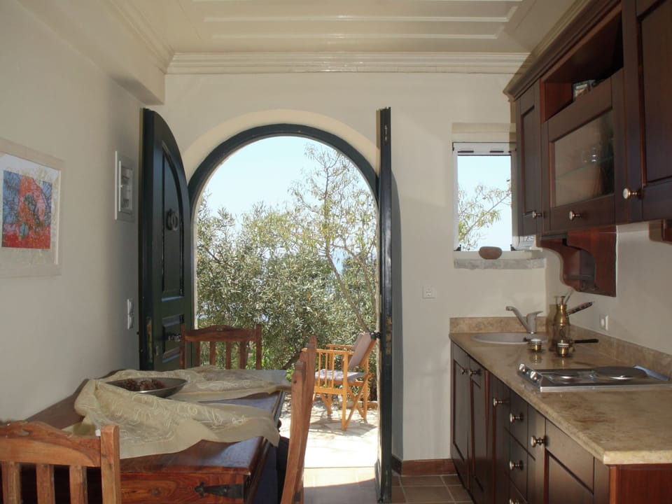 Villa | Private kitchen | Highchair, cookware/dishes/utensils