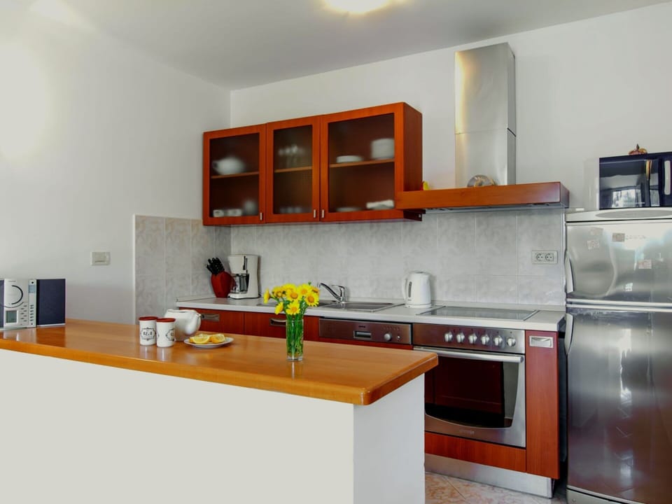 Villa | Private kitchen | Highchair