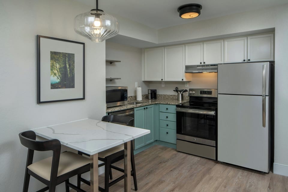 Suite, 2 Bedrooms | In-room safe, desk, laptop workspace, iron/ironing board