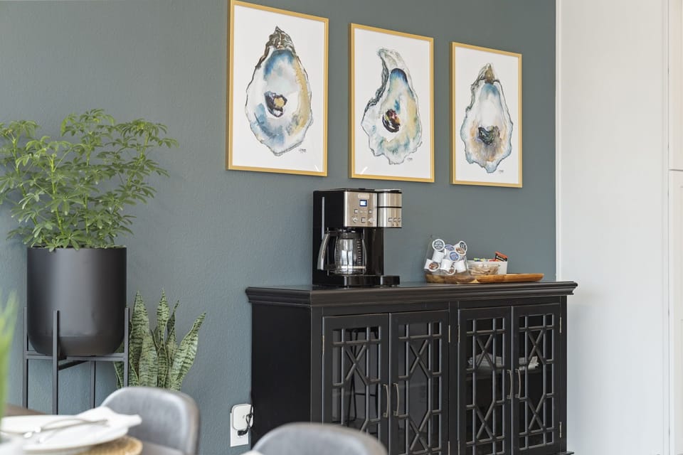 Our coffee bar has a Cuisinart combo coffee maker and K-cup dispenser.