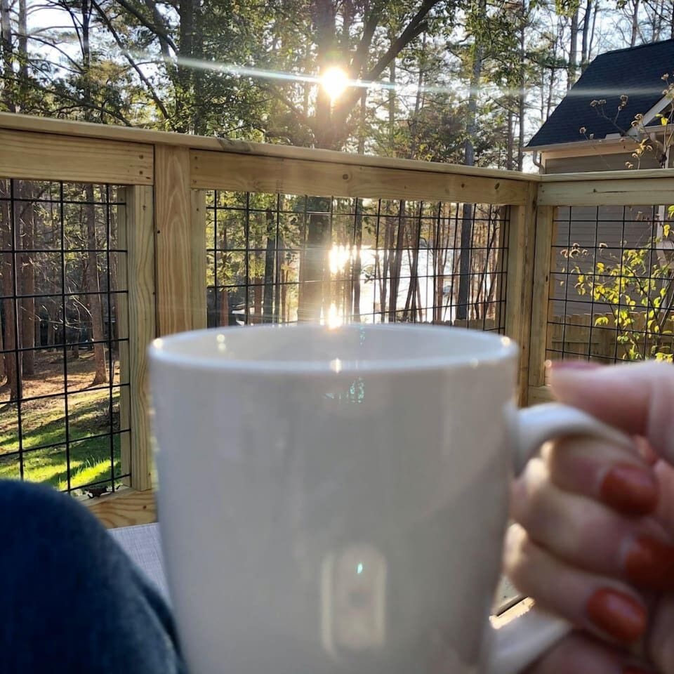 Sip your coffee while you take In the serene lake views from the private deck off of the master bedroom.
