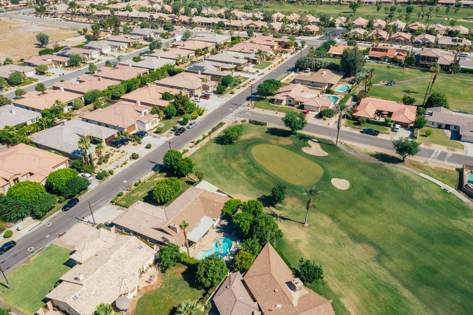 Aerial view of the home and golf course.