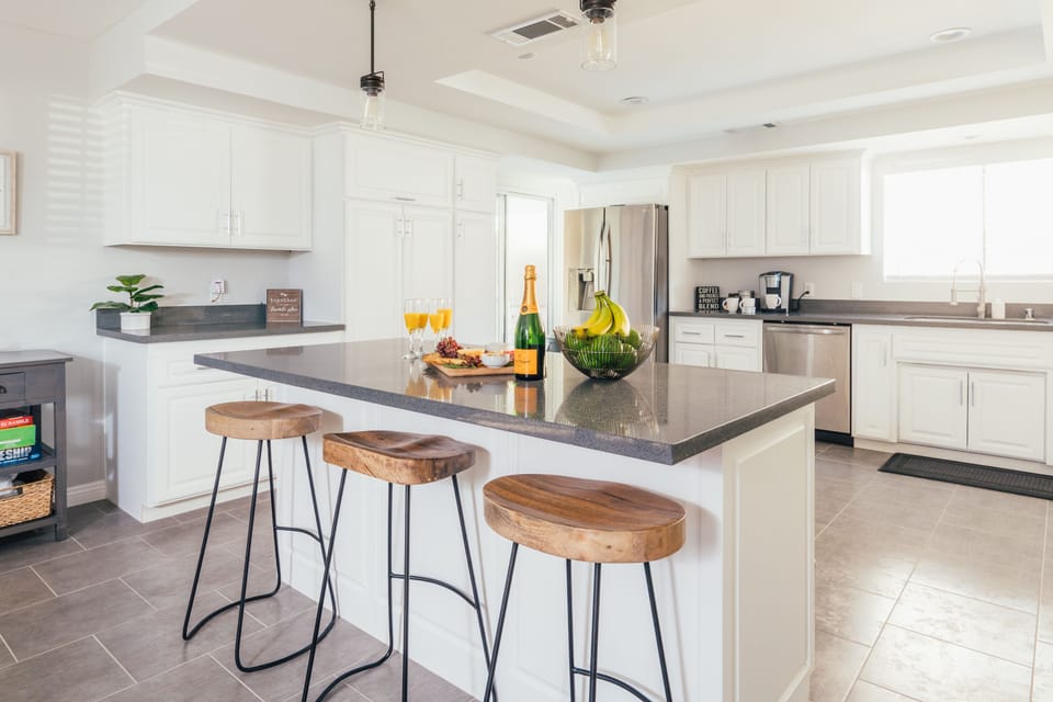 Kitchen area with breakfast bar.