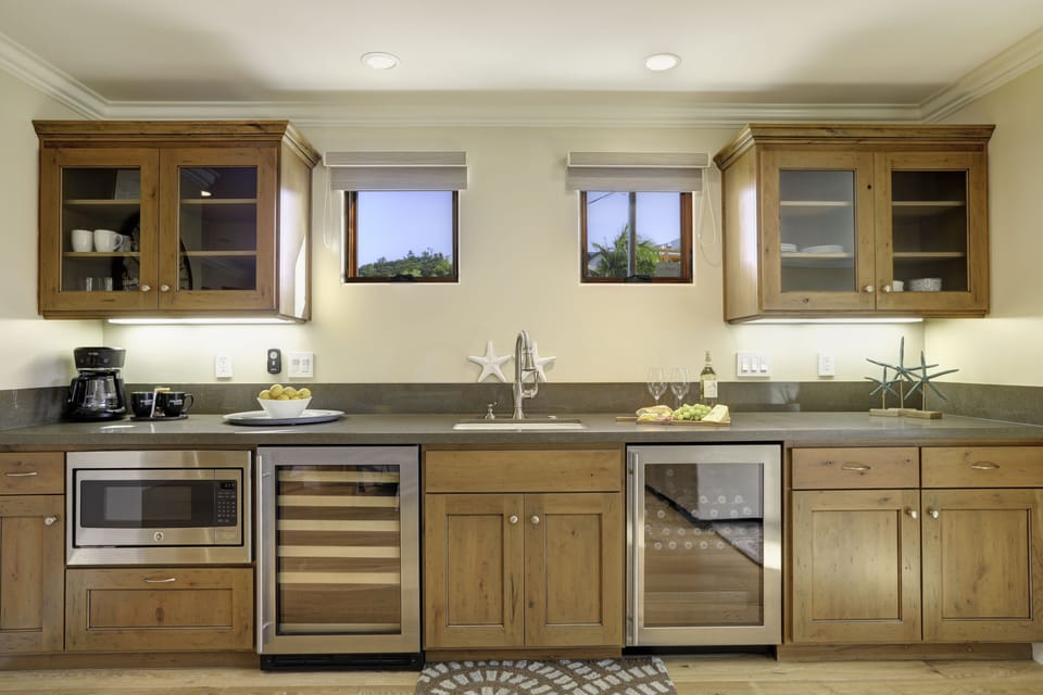 You'll find all the kitchenette essentials here including your morning coffee maker, microwave, and two refrigerators.