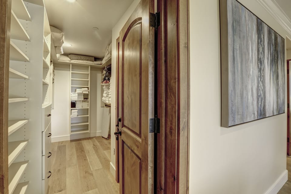 Walk in closet for your vacation wardrobe storage.