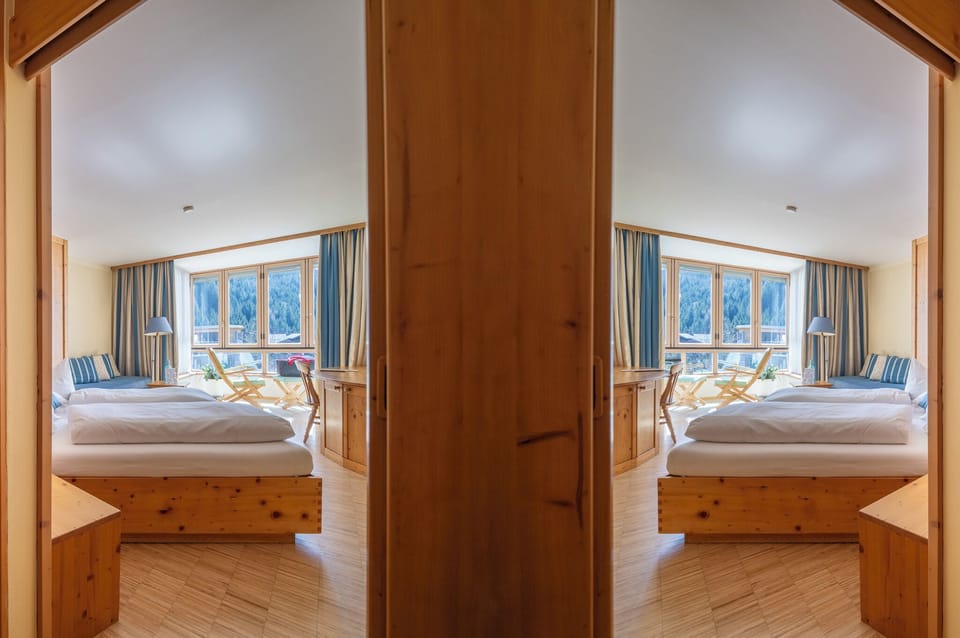 Family Suite, Balcony, Mountain View | Premium bedding, in-room safe, desk, laptop workspace
