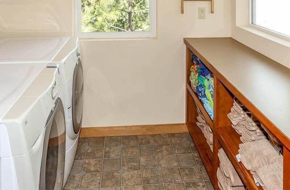 Your own laundry room ensures fresh towels and clothes throughout your stay, with convenient storage for all your essentials.
