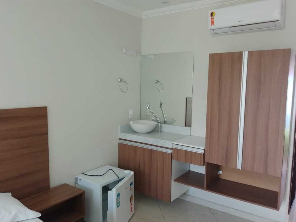 Deluxe Triple Room | Minibar, individually furnished, bed sheets