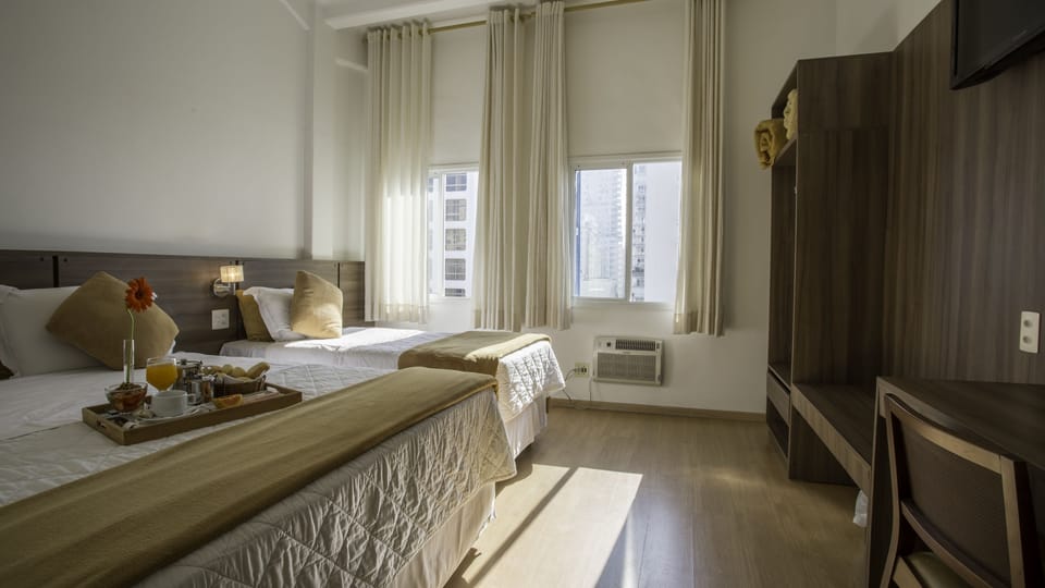 Luxury Suite, Beach View | Minibar, desk, free WiFi, bed sheets