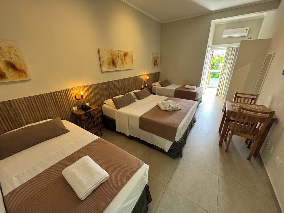 Superior Quadruple Room | Minibar, desk, free WiFi, bed sheets