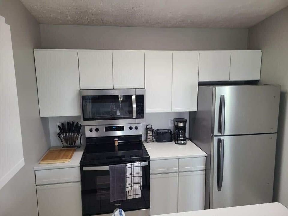 Condo 1 Kitchen.  All appliances new spring of 2021!