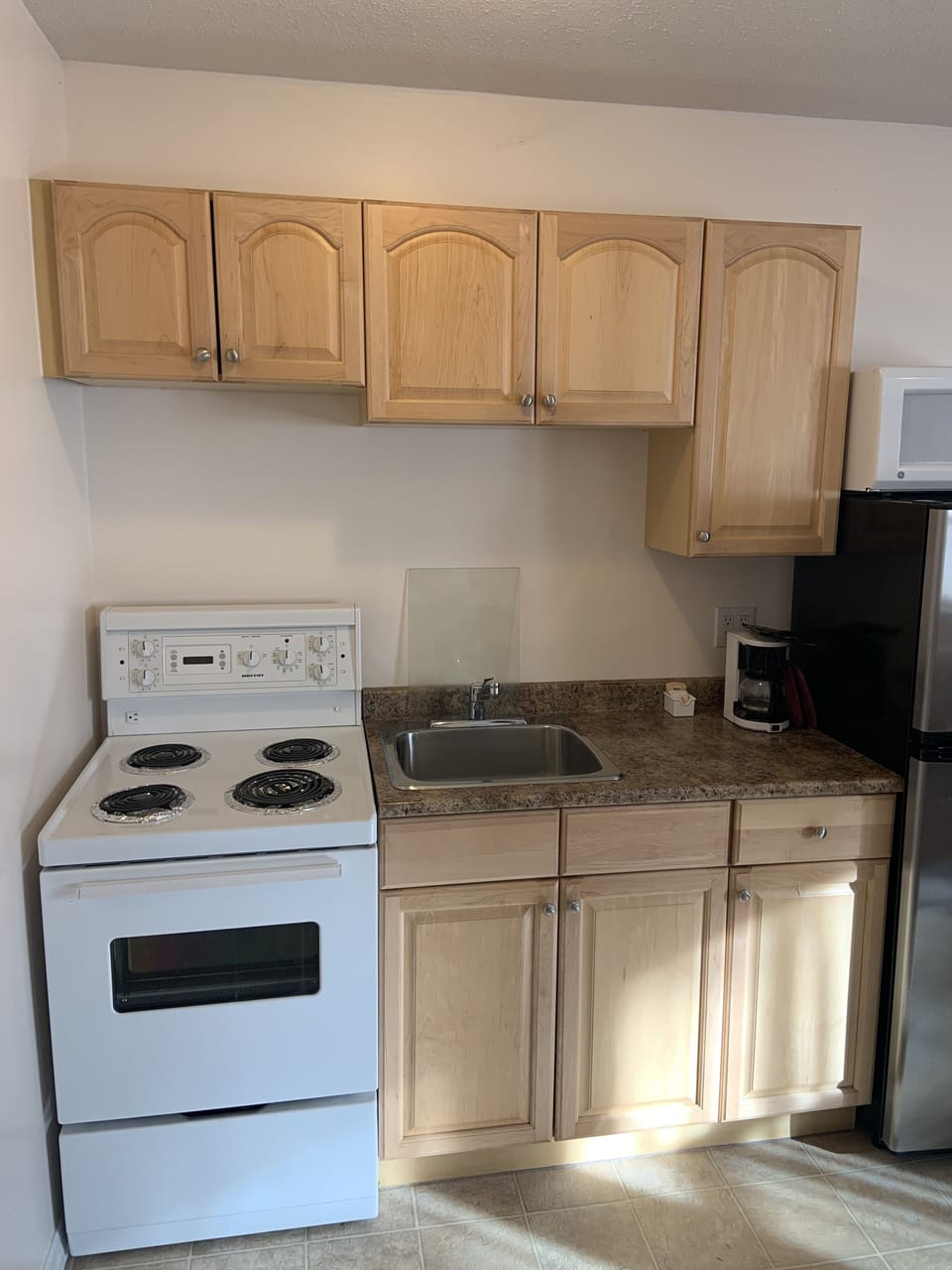 Fridge, microwave, coffee/tea maker, toaster