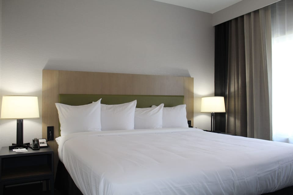 Suite, 1 Bedroom, Non Smoking | Desk, laptop workspace, blackout drapes, iron/ironing board