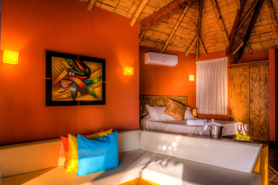 Luxury Suite, 1 Queen Bed with Sofa bed, Ocean View | Living room | 32-inch LED TV with satellite channels, TV, first-run movies