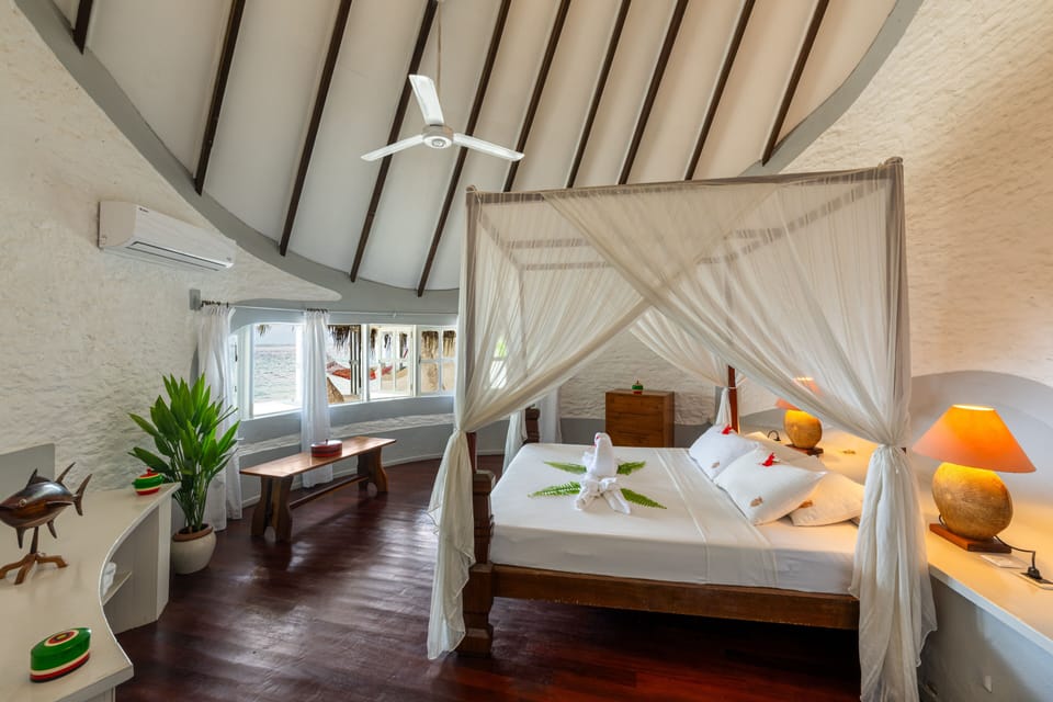 Deluxe Beach Villa with Private Beach | Minibar, in-room safe, desk, laptop workspace