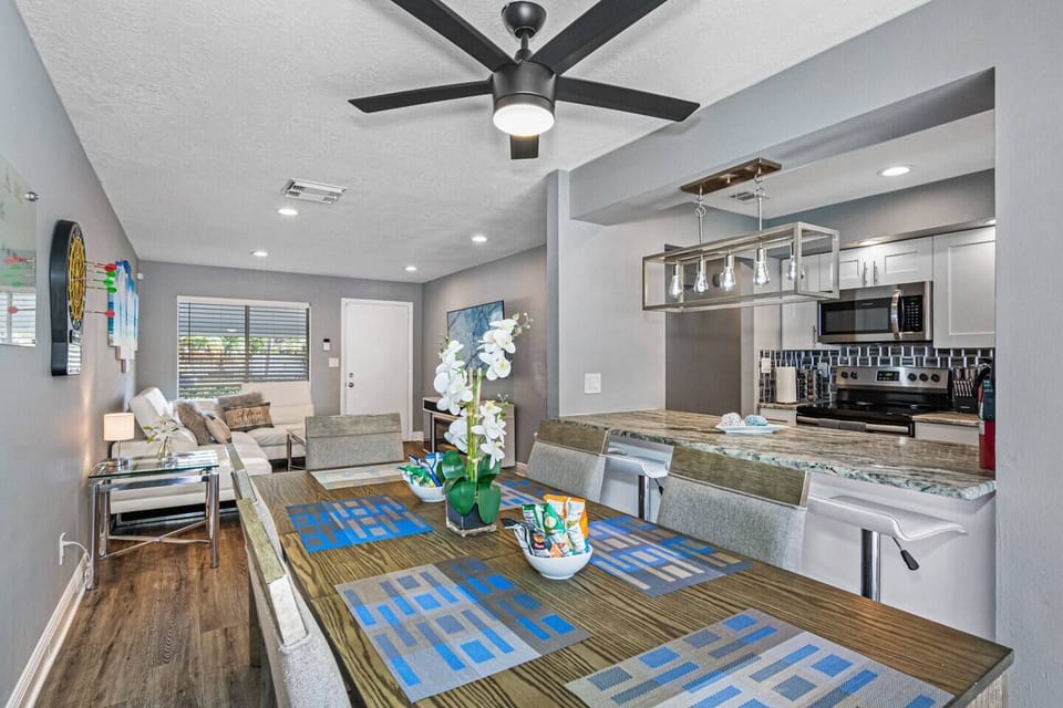 This elegant dining table can seat 6 people comfortably. Share great memories while eating freshly made meals in our modern kitchen! If you like sharing stories with family and friends, send us a message now!