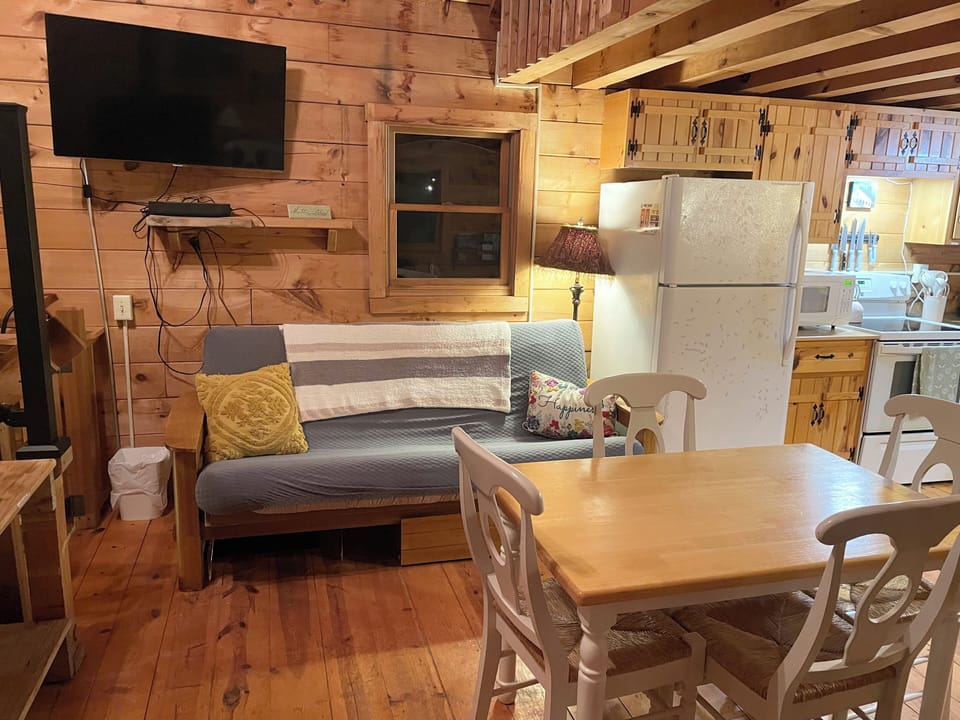 Dining table, couch, television