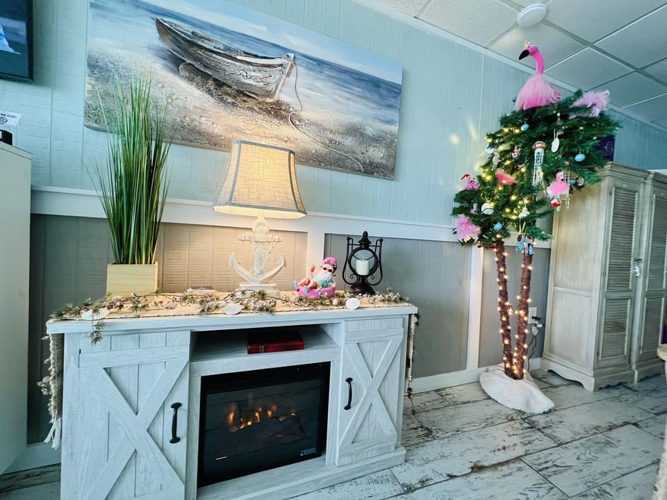 Ready for Christmas with a whimsical pink Flamingo Palm Christmas tree