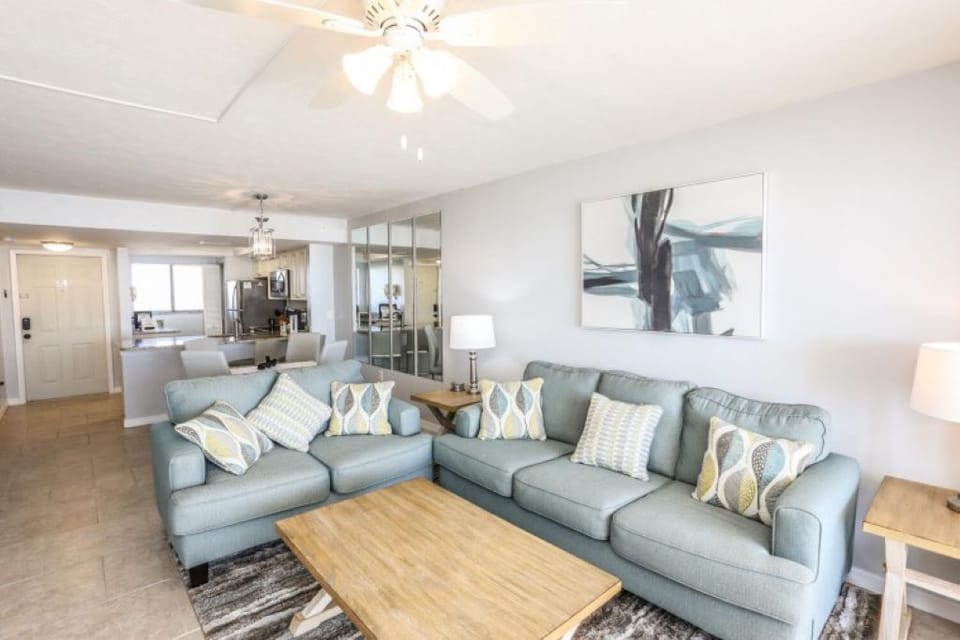 Living room with love seat and sofa bed