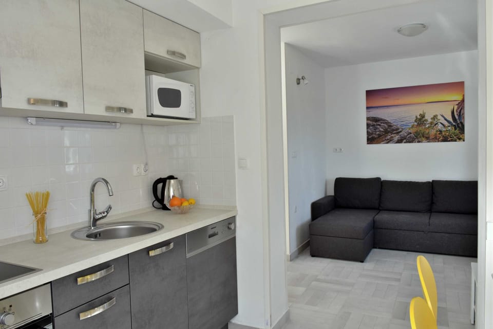 Apartment (Two Bedroom Apartment with Sea View) | Living room | TV