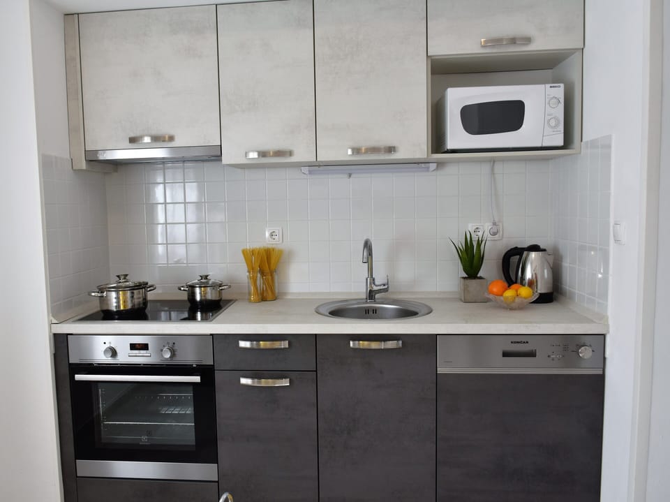 Apartment (Two Bedroom Apartment with Sea View) | Private kitchen | Fridge