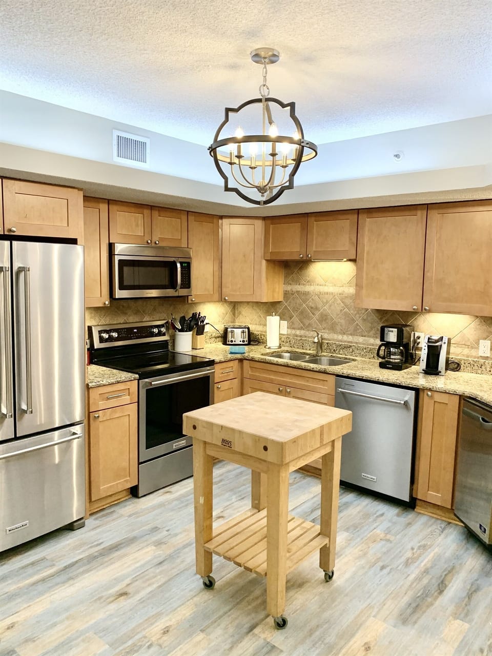 All new stainless KitchenAid appliances and Manitowac ice machine