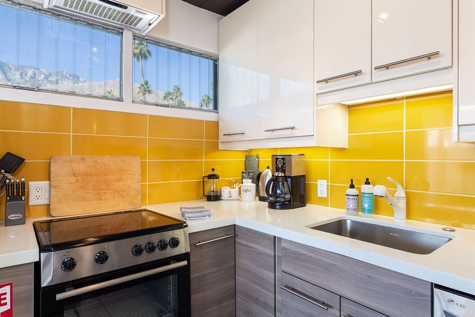 Fully stocked kitchen with stove and full sized oven