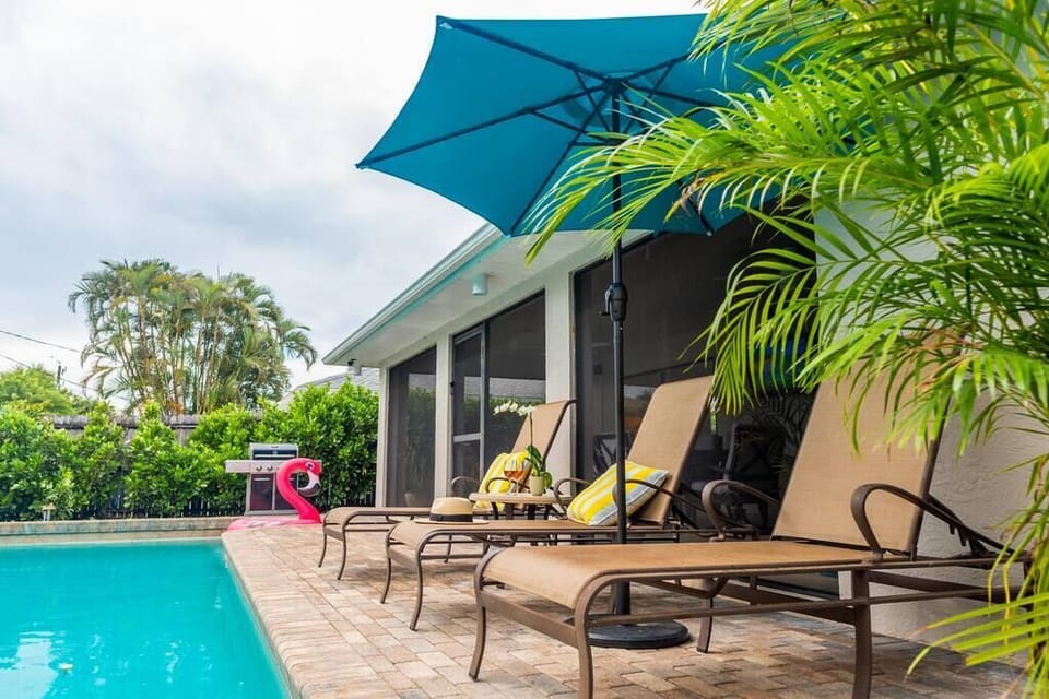 Catch some rays and cool off in this home's lovely heated pool! 
