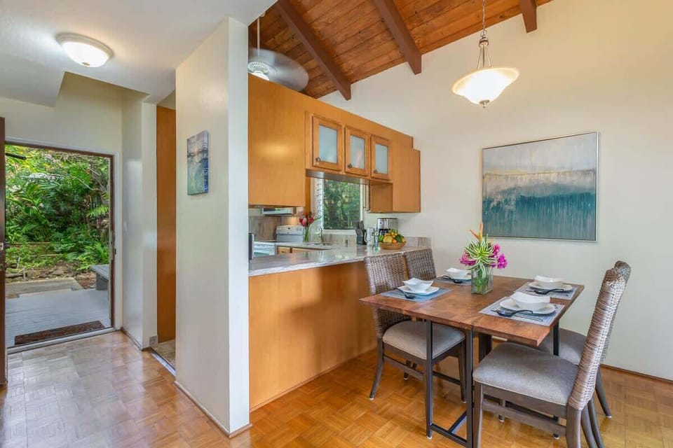 Dining room and kitchen Fruit and items shown are for staging purposes only.